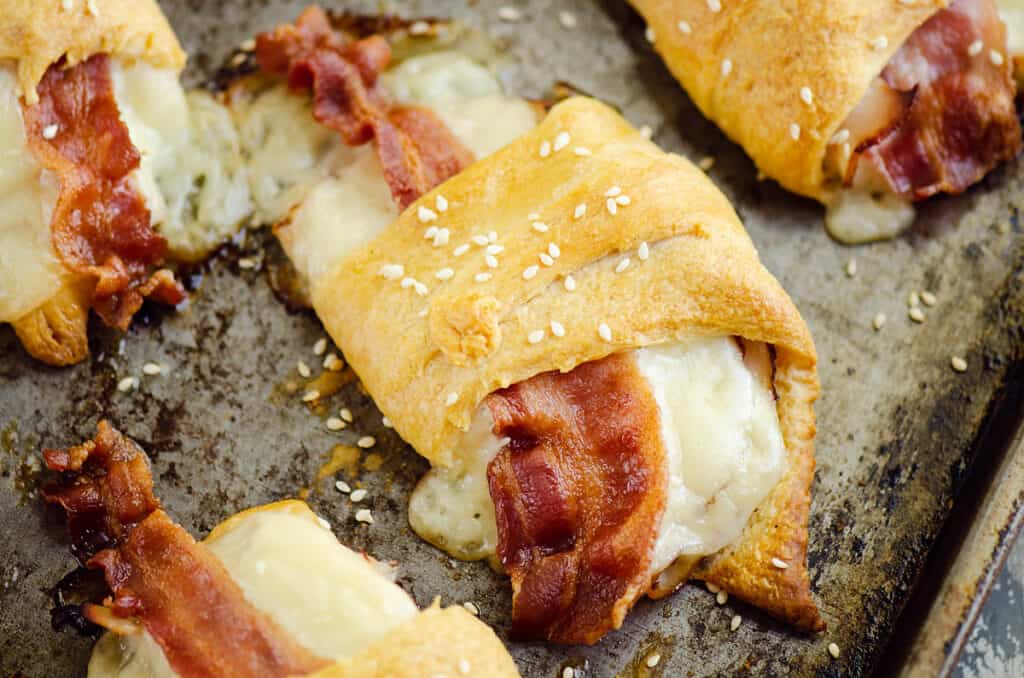 cheesy bacon and turkey crescent rolls on sheet pan