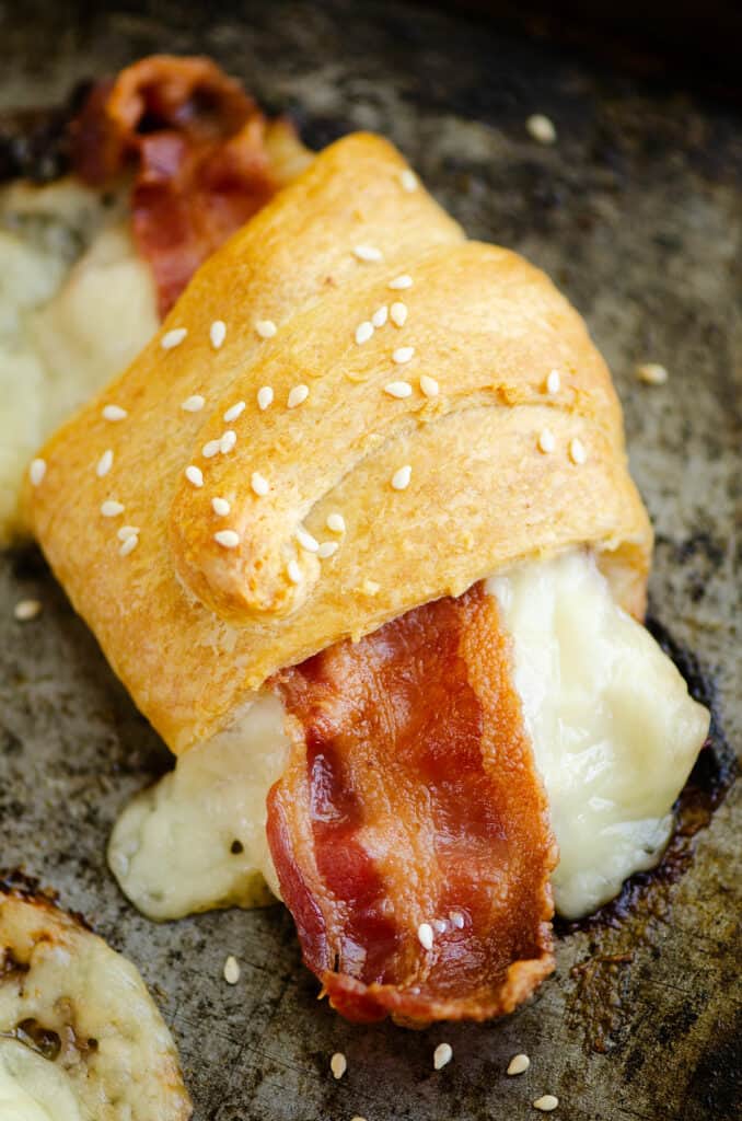 crispy bacon and swiss cheese in crescent roll