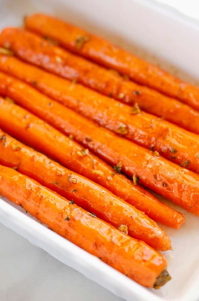 carrots topped with garlic and thyme butter