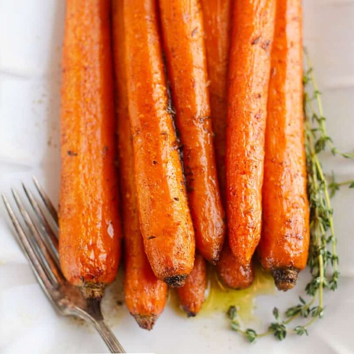 roasted brown butter carrots on scalloped platter with thyme