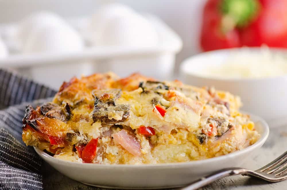 slice of ham and vegetable egg bake on kitchen table