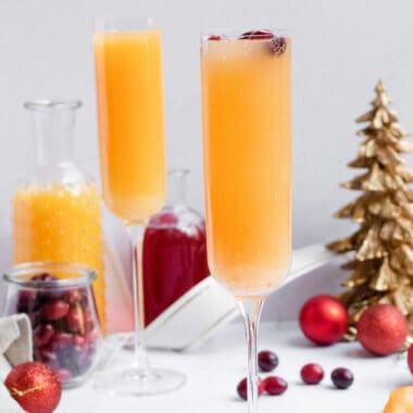 cranberry orange mimosa on holiday scape table