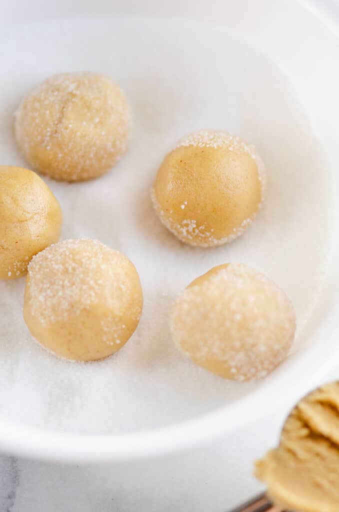 peanut butter blossoms rolled in granulated suagr