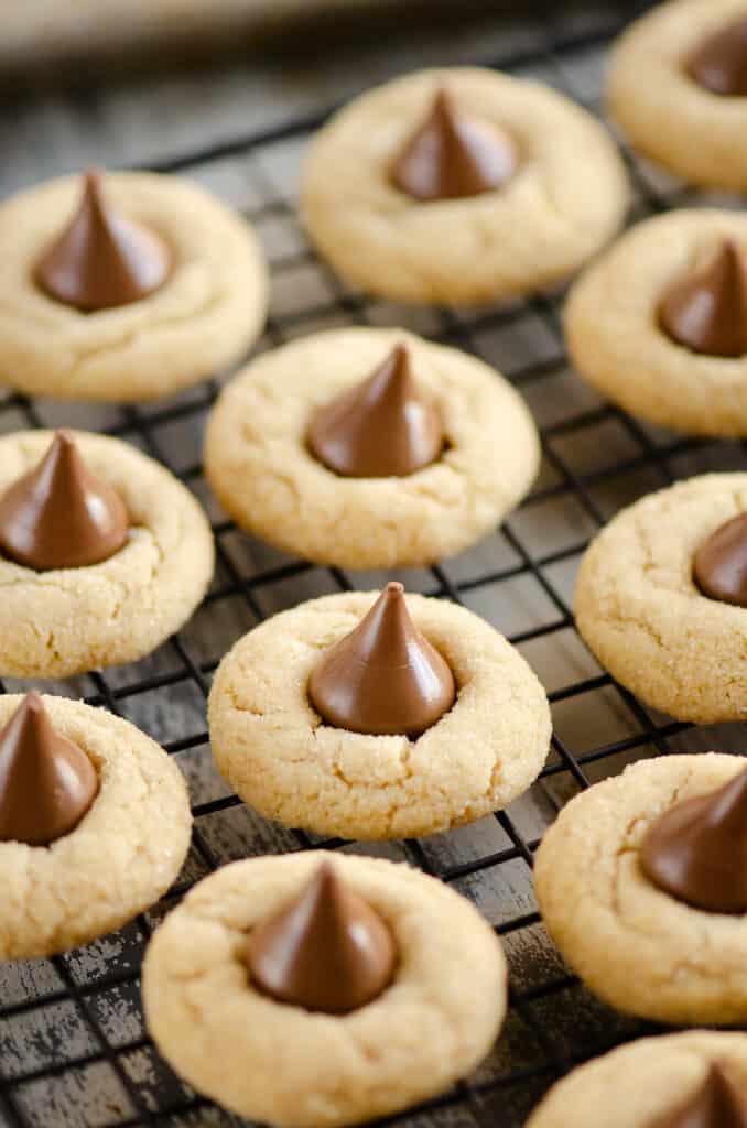 peanut butter blossom cookies cooling on rack