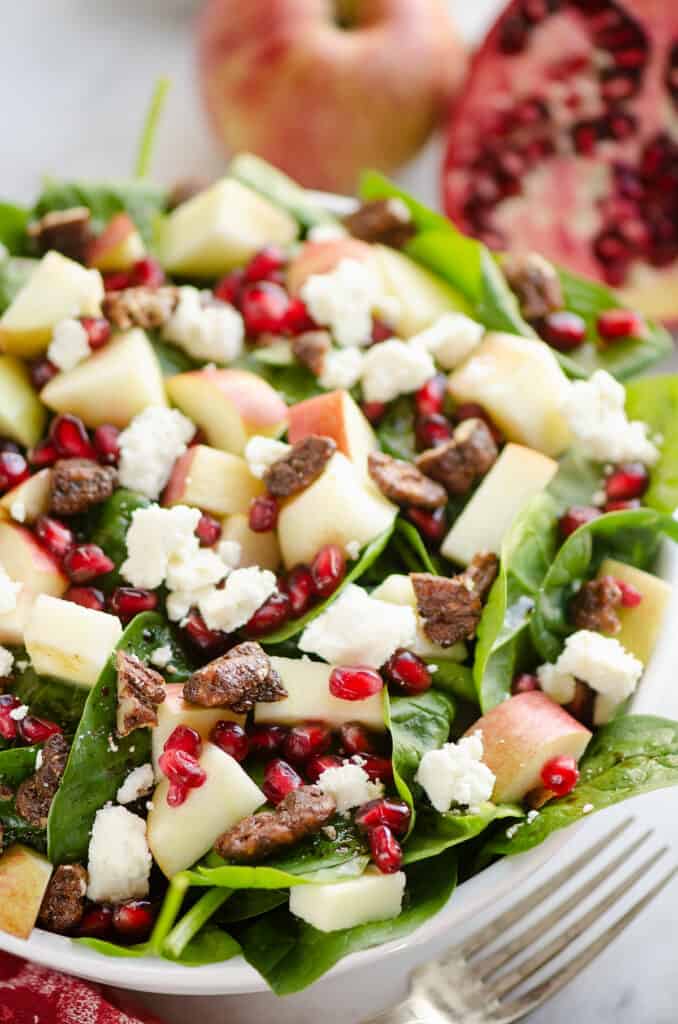 fresh spinach salad with pomegranates and feta