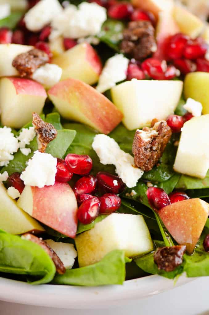 apples, feta and pecans on bed of spinach