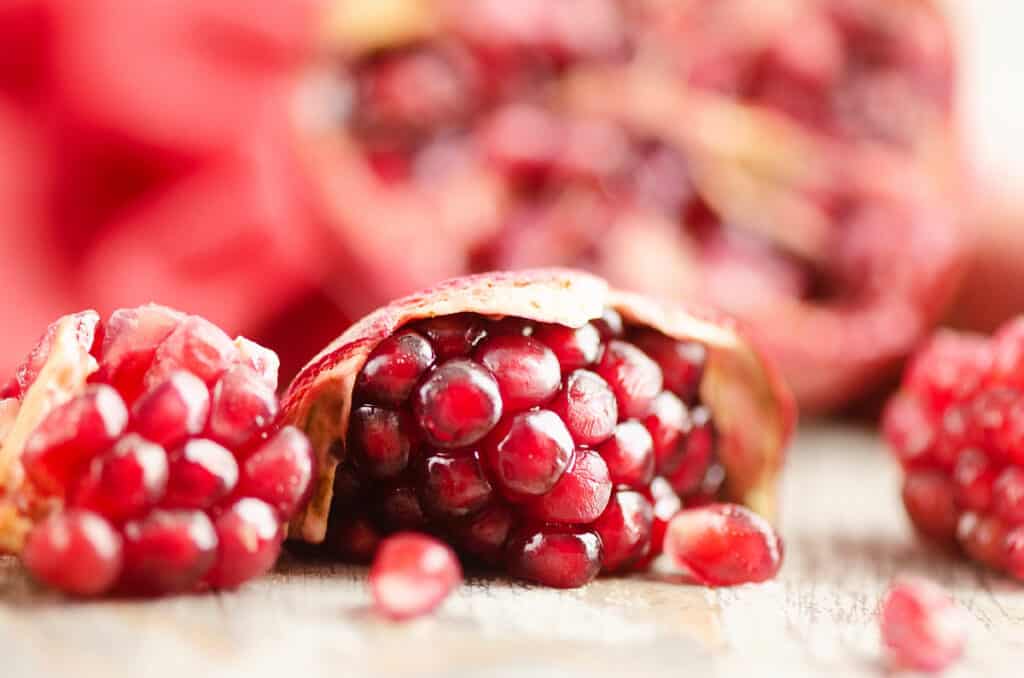 pomegranate seeds on table