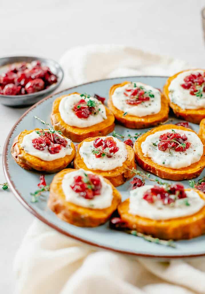 sweet potato bites on blue plate with napkin