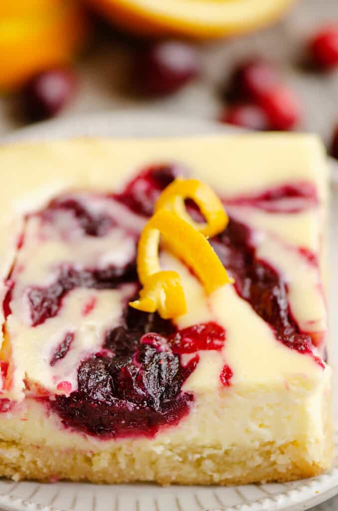 cranberry orange cheesecake swirl bar on plate