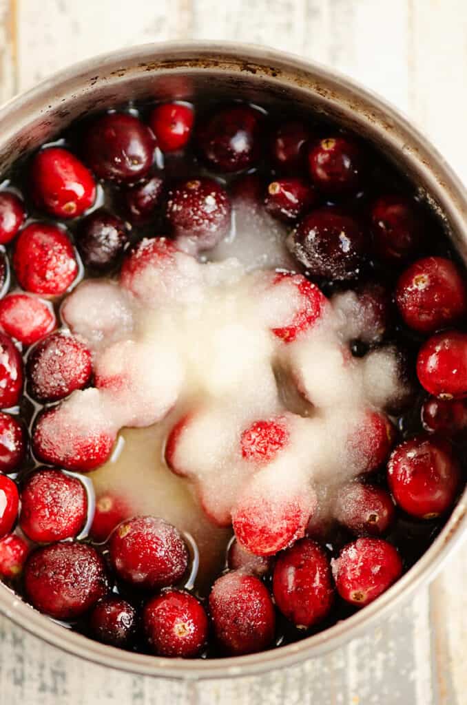 cranberries, sugar, Grand Marnier and orange juice in small saucepan