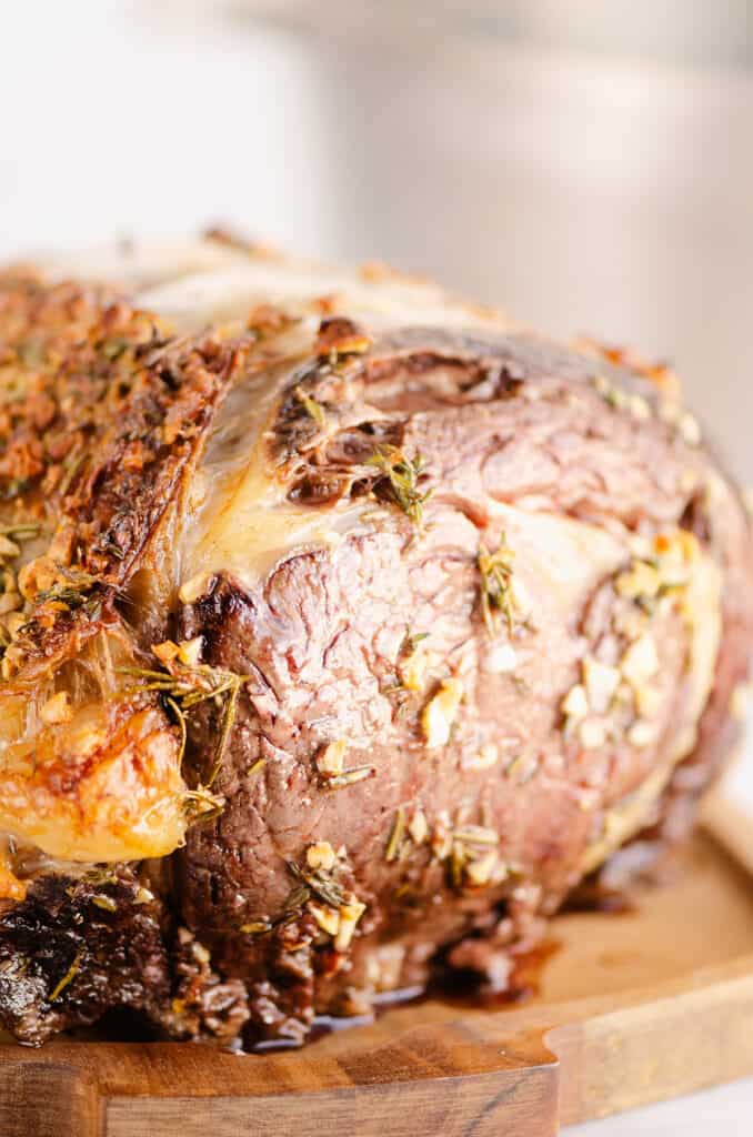 garlic butter prime rib roast on cutting board