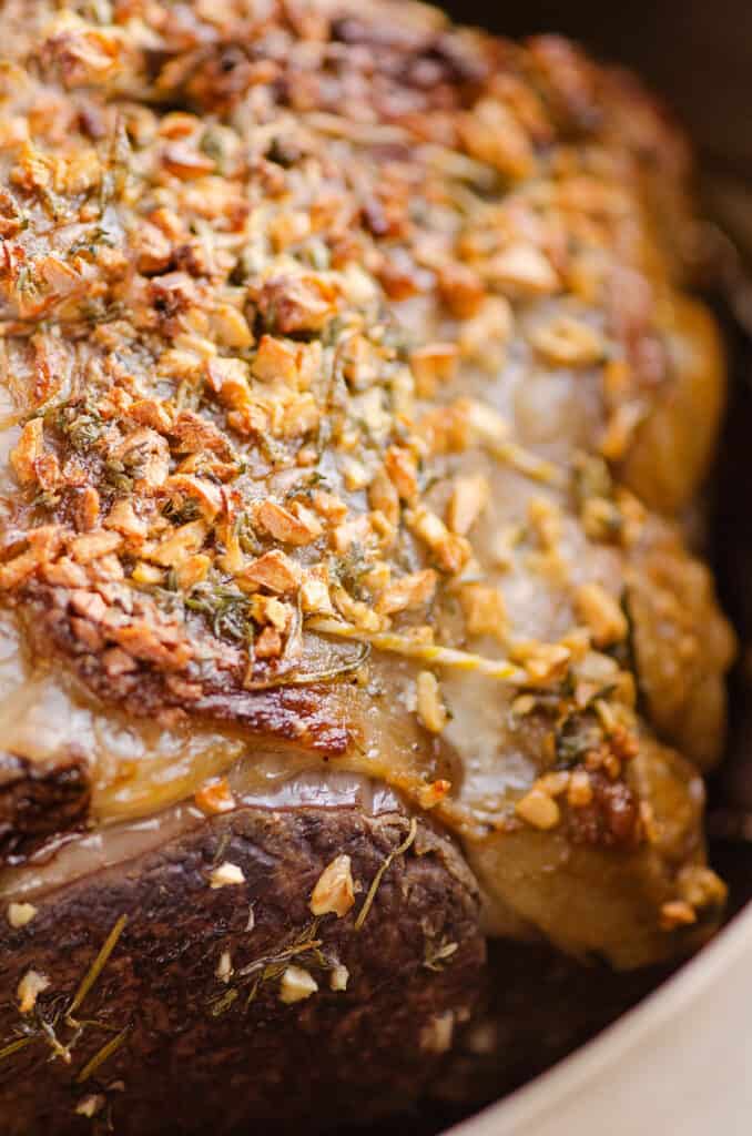 garlic butter crusted prime rib in pan