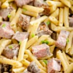 creamy leftover prime rib and penne pasta in skillet