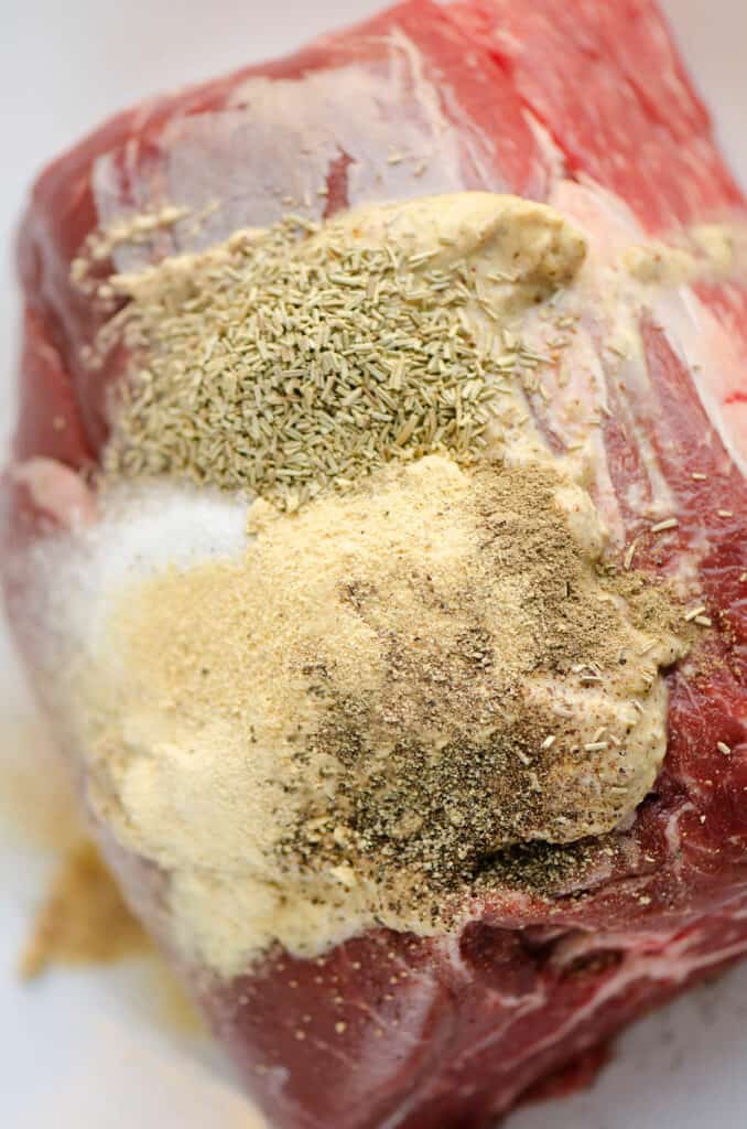 rub spices on chuck roast