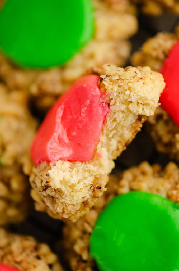 Center of walnut thumbprint cookie with frosting