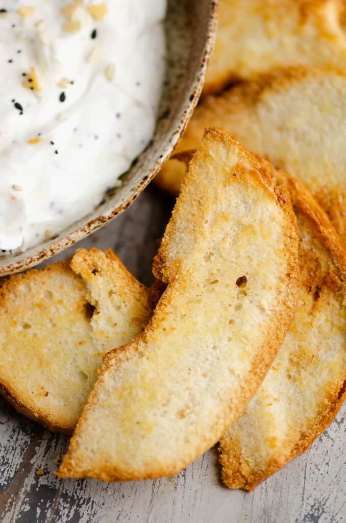 bagel chips with everything bagel dip in bowl