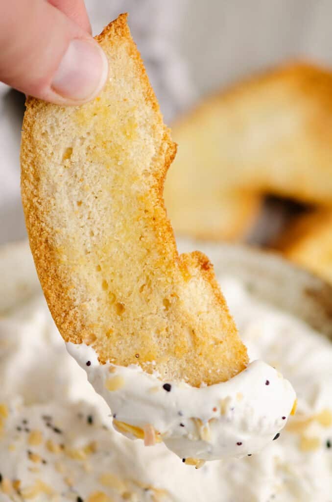 bagel chip dipped in everything bagel dip