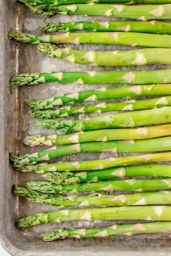 asparagus on a baking sheet