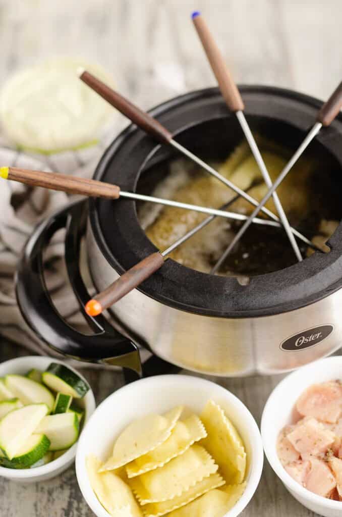 forks in broth fondue pot