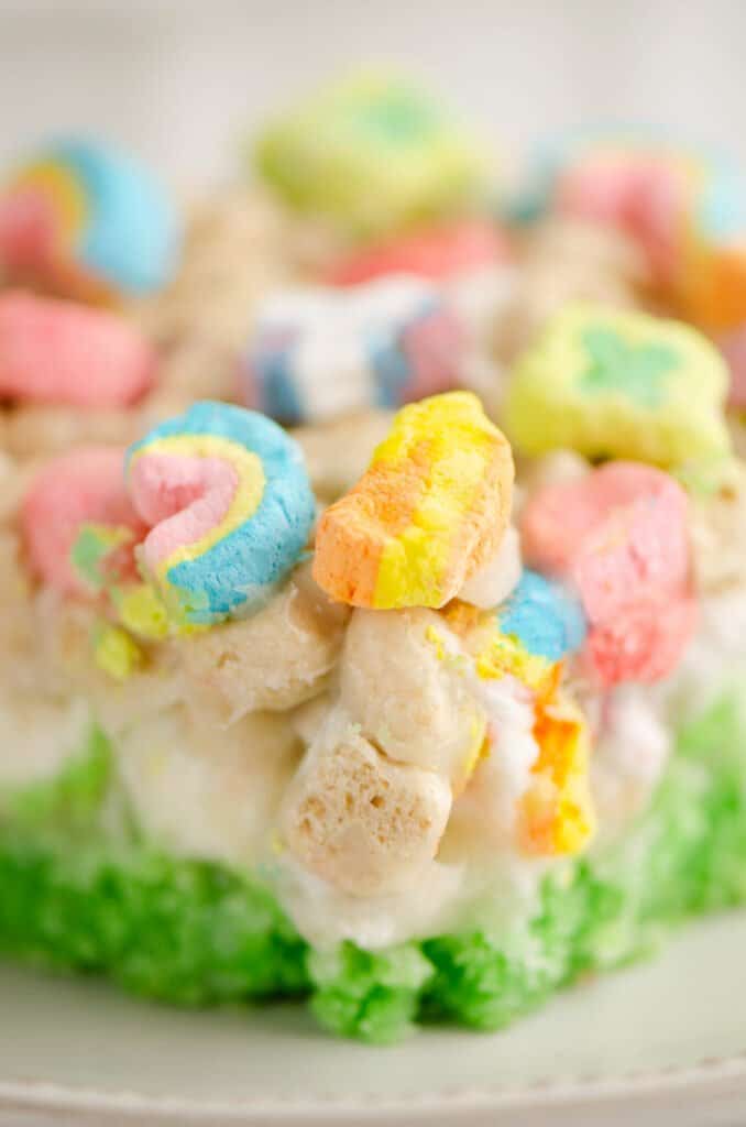 cake, marshmallow and cereal bars up close on plate