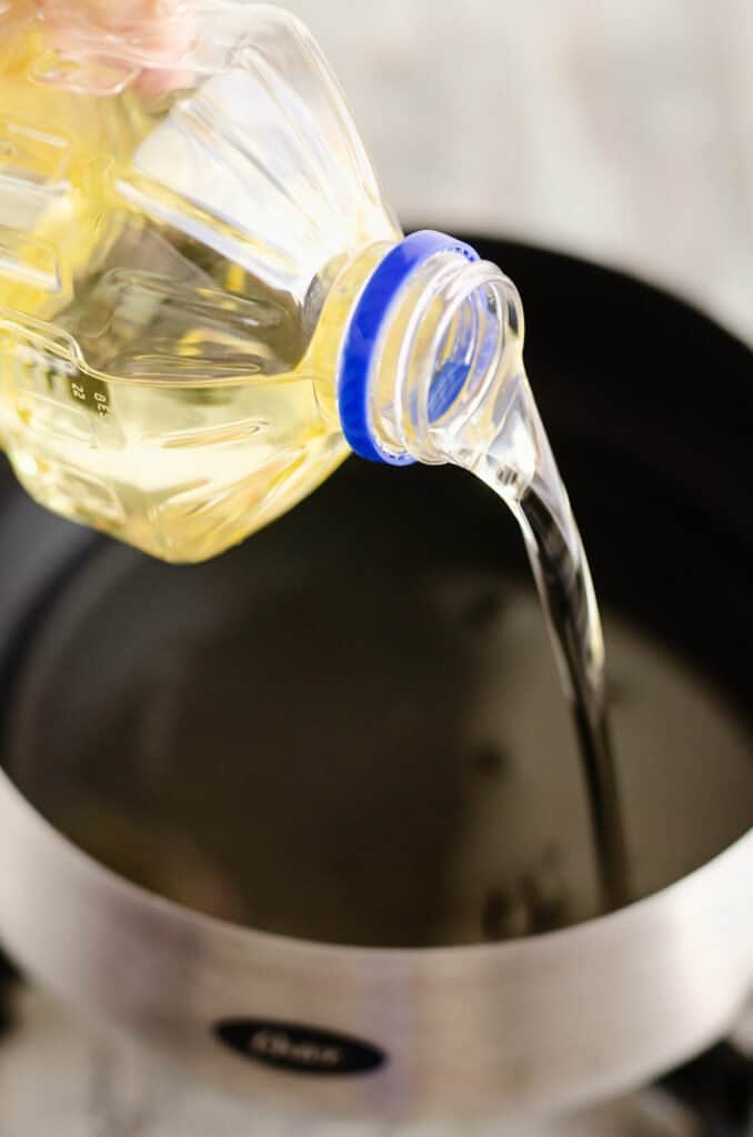 vegetable oil poured into fondue pot