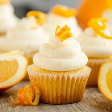 orange cupcake with orange peel and buttercream