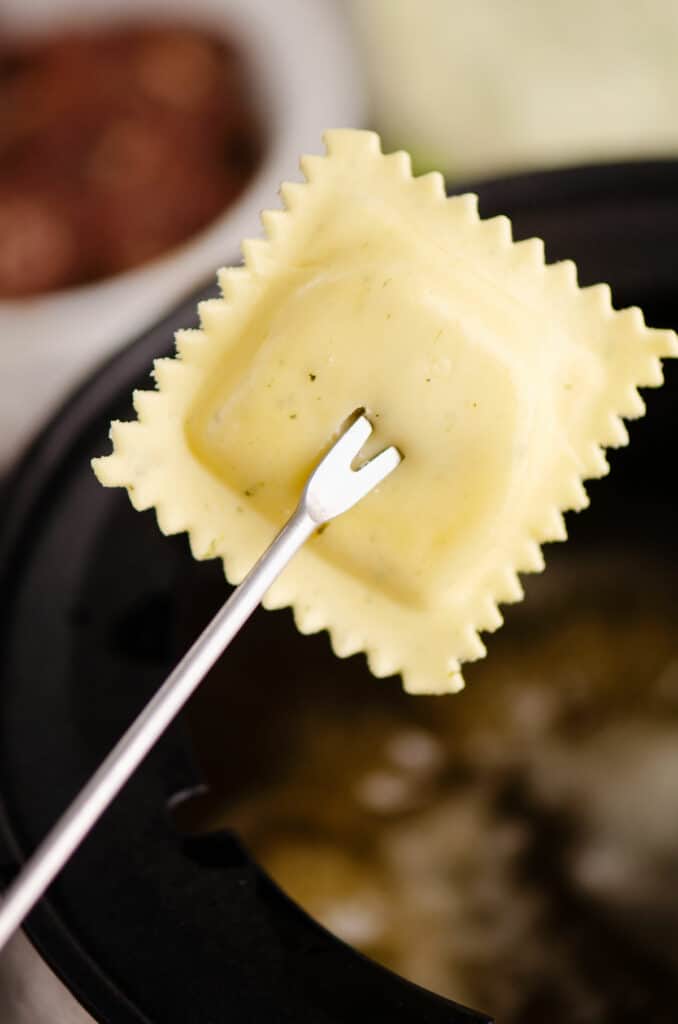 ravioli on fondue fork