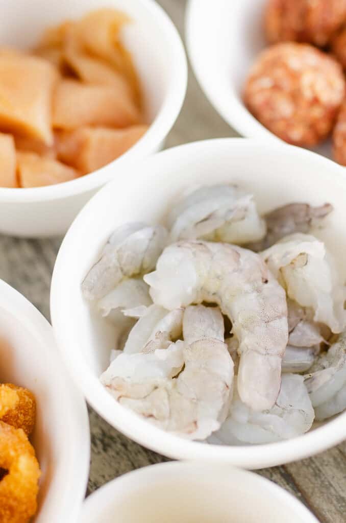 raw shrimp in white bowl