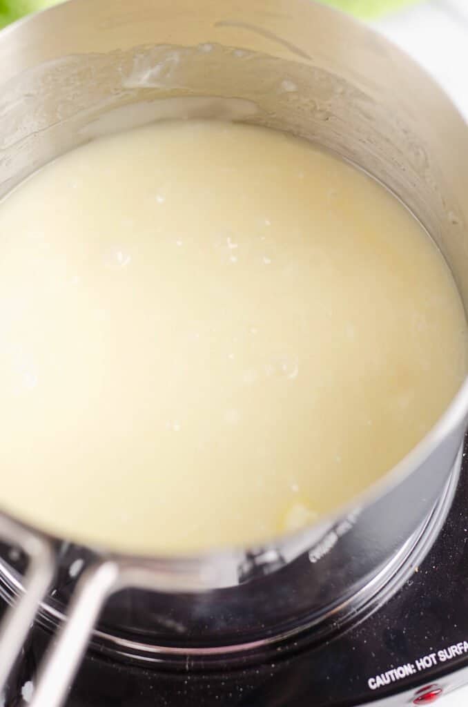 white chocolate corn syrup mixture in pan
