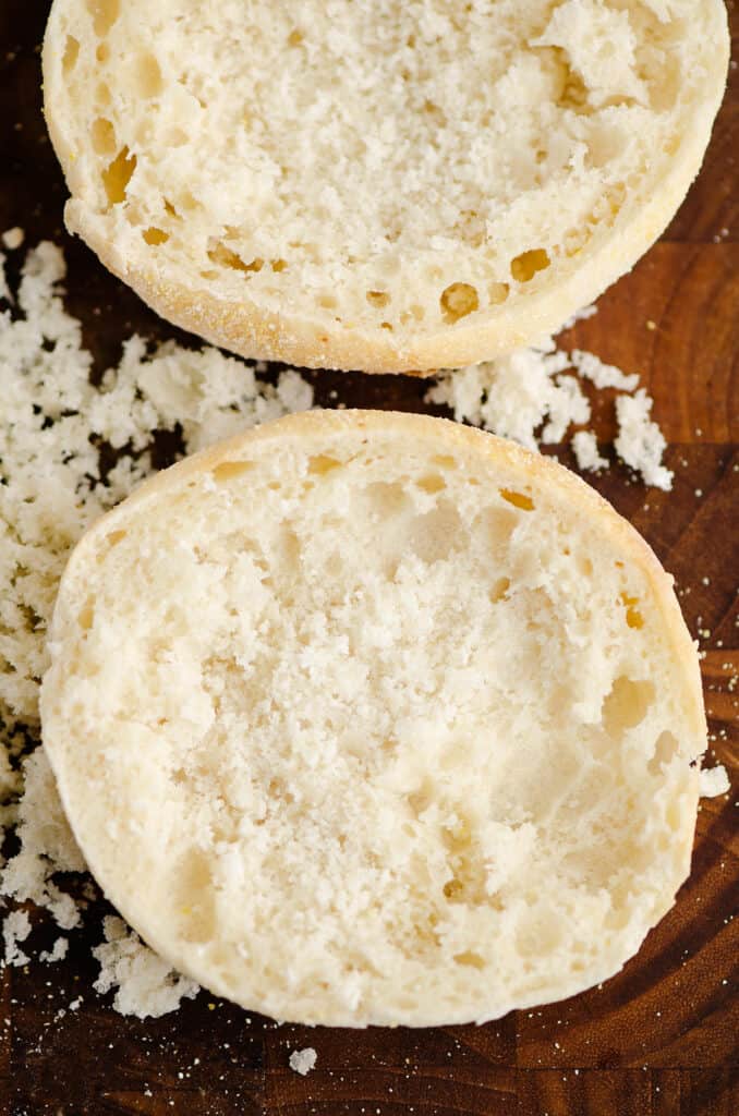 english muffin halves on cutting board