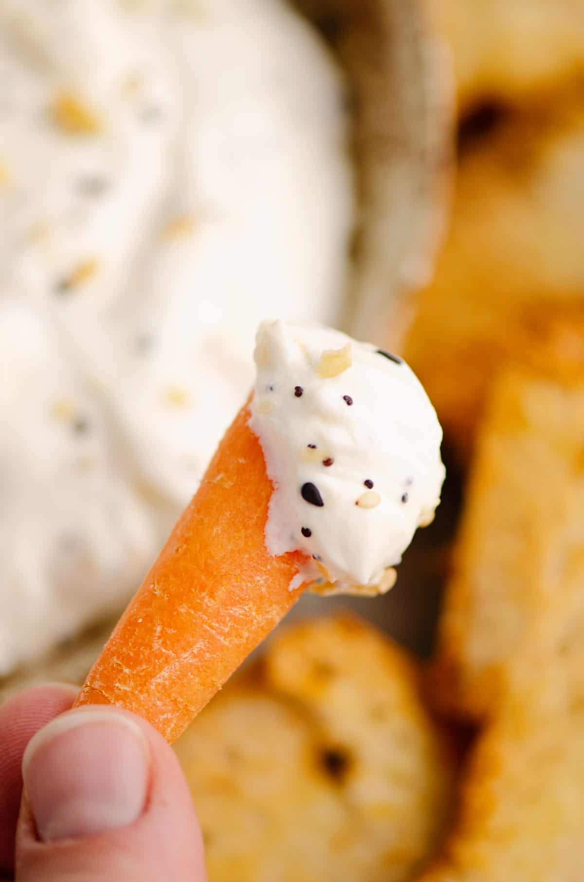 carrot with everything bagel dip on it