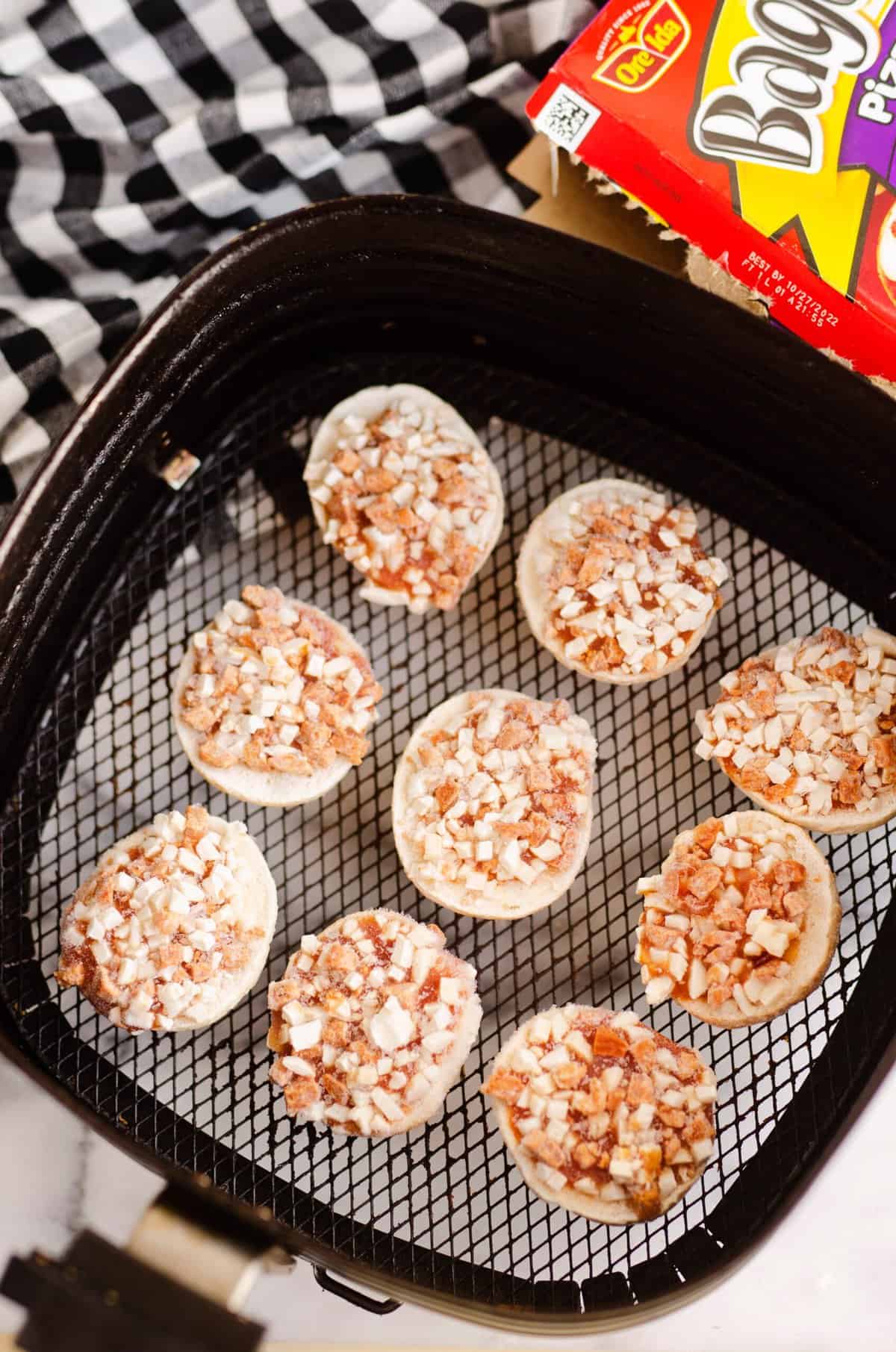 frozen uncooked bagel bites in Air fryer basket