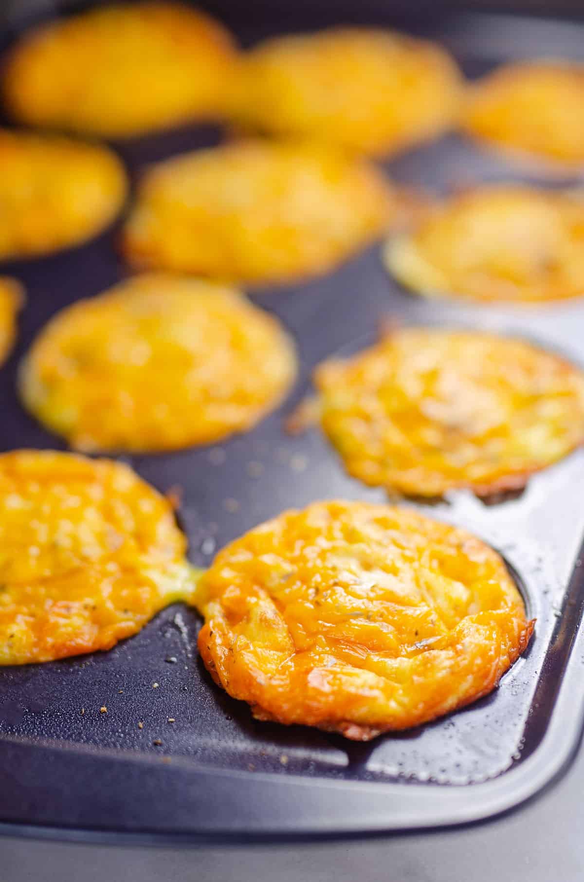 ham and cheese egg bites in muffin tin