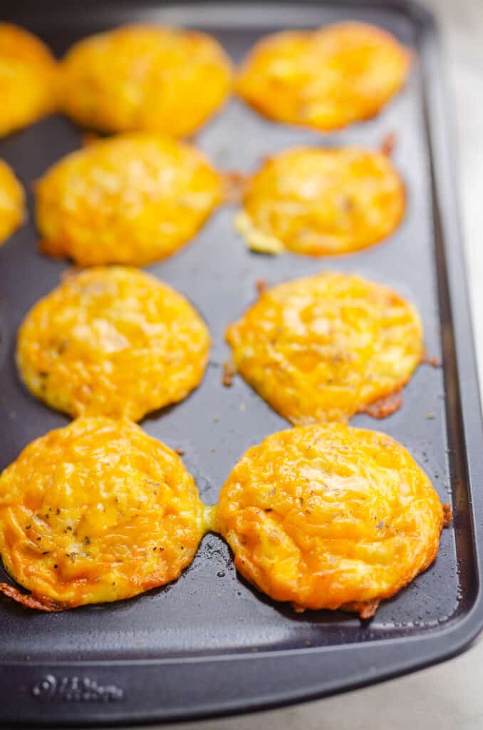 Cheesy ham and egg muffins in pan