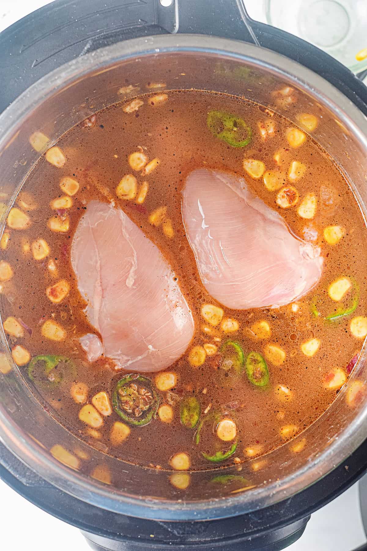 chicken breasts in soup with corn and jalapenos