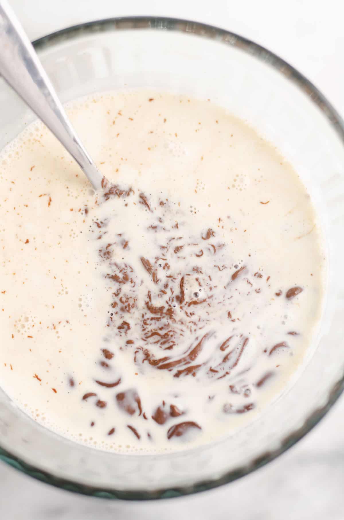 cream and chocolate in bowl with fork