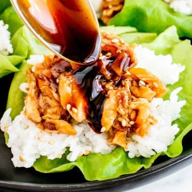leftover salmon and rice lettuce cup with teriyaki sauce spooned over it