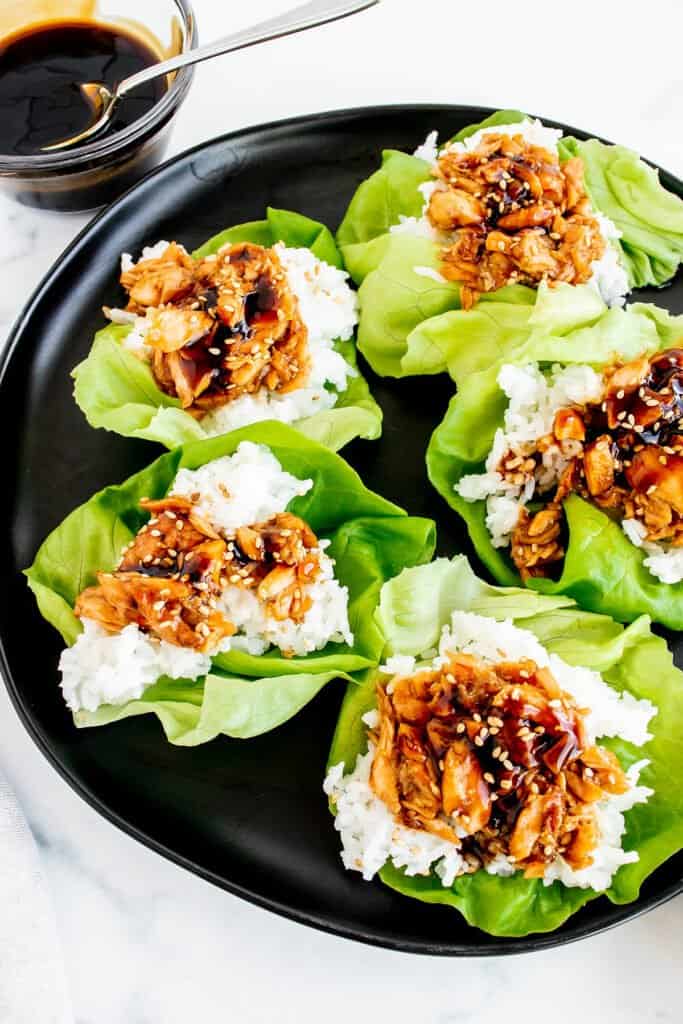 teriyaki salmon and rice lettuce cups on plate