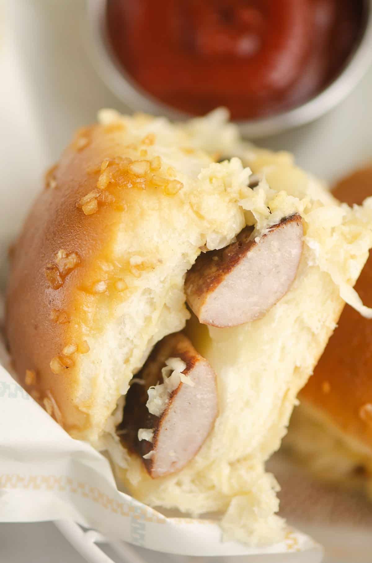 brat slider in tray with ketchup