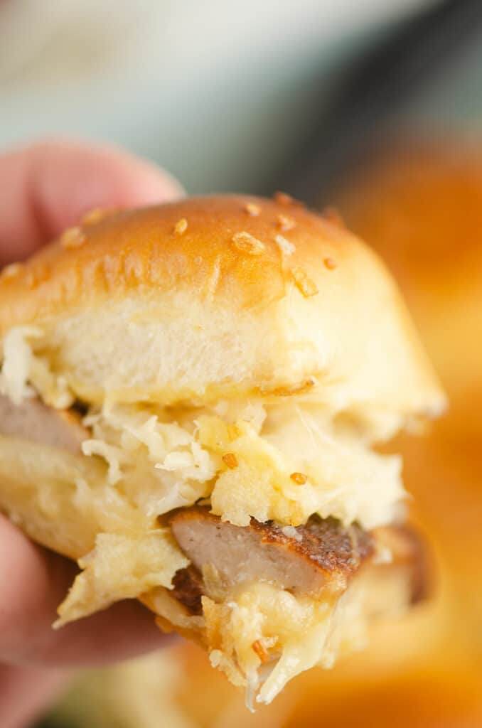 sauerkraut brat slider in hand