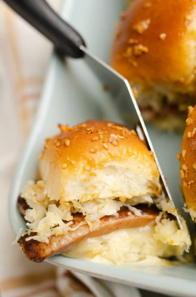 sauerkraut brat slider in pan with spatula