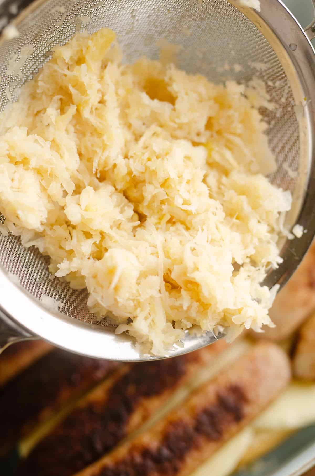 sauerkraut in mesh strainer