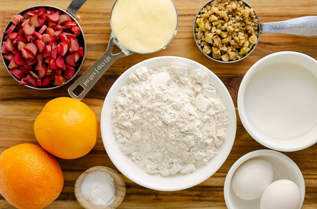 rhubarb walnut orange bread ingredients on cutting board