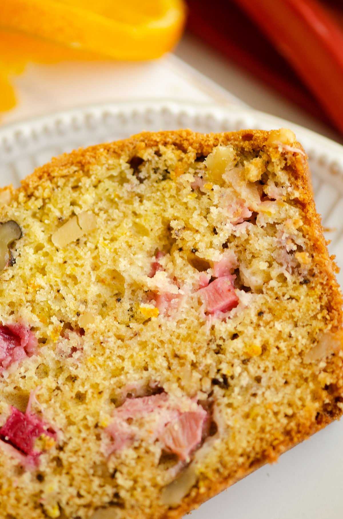 slice of rhubarb walnut orange bread on plate