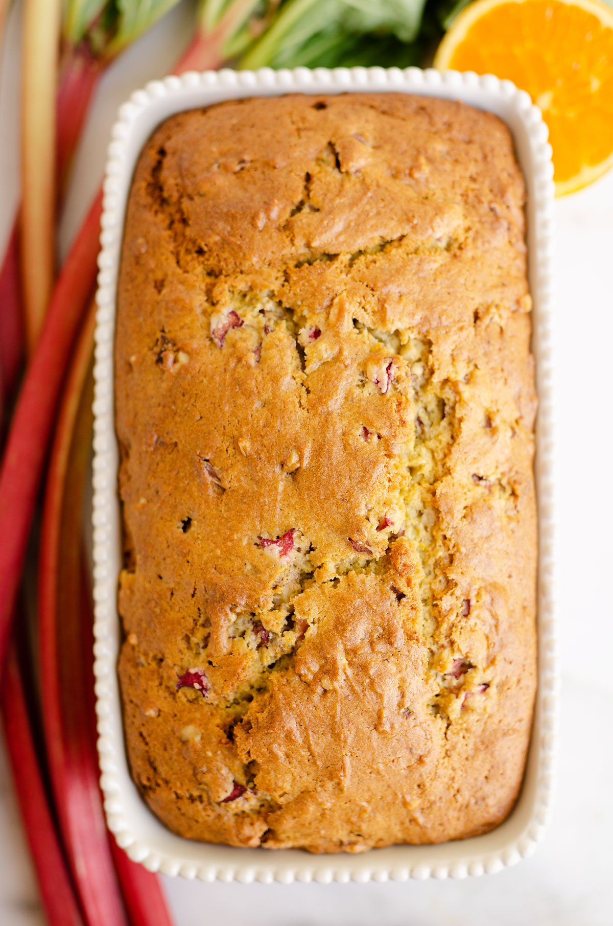 rhubarb orange bread in white loaf pan