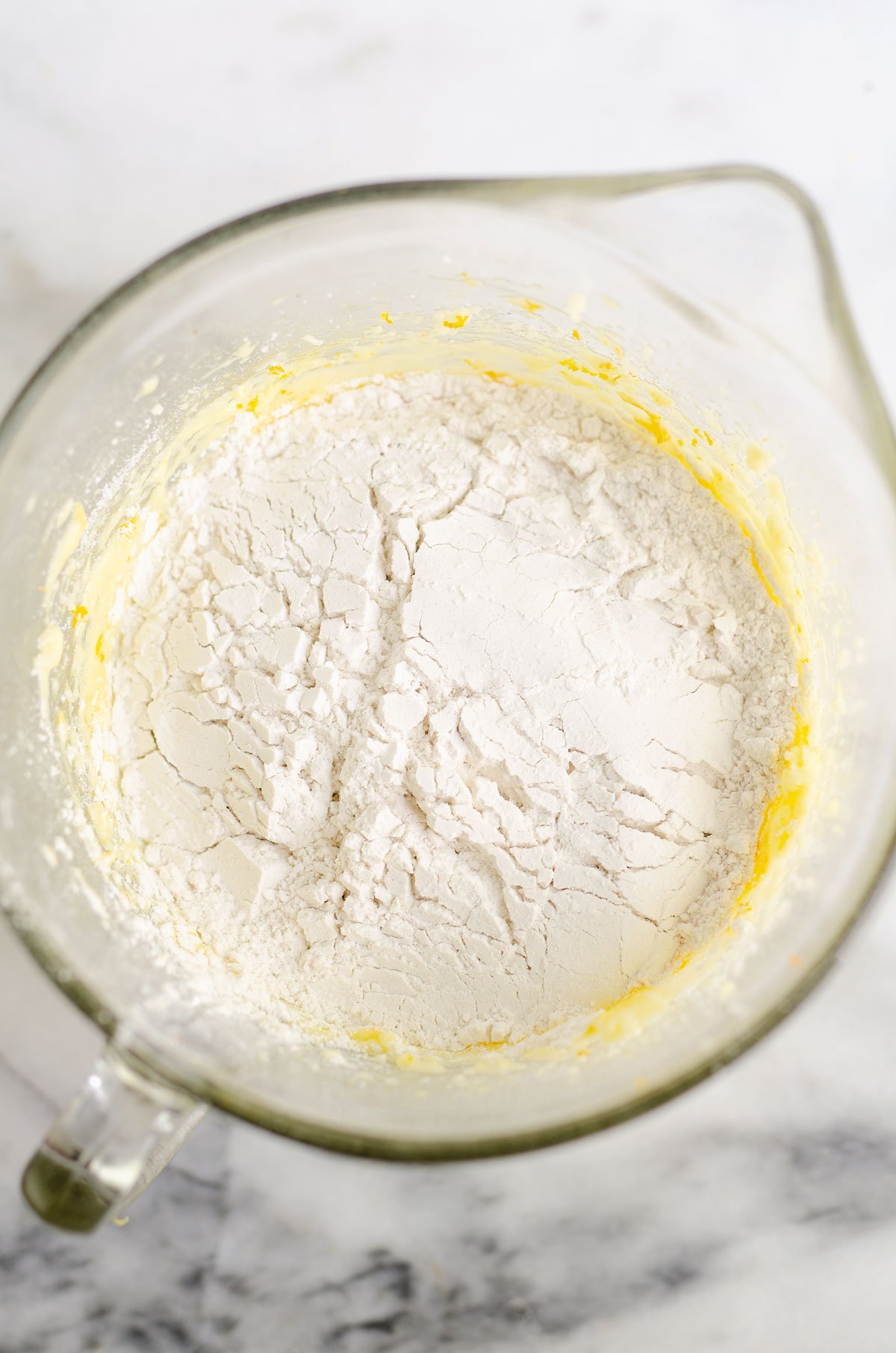 dry ingredients on top of wet ingredients in bowl