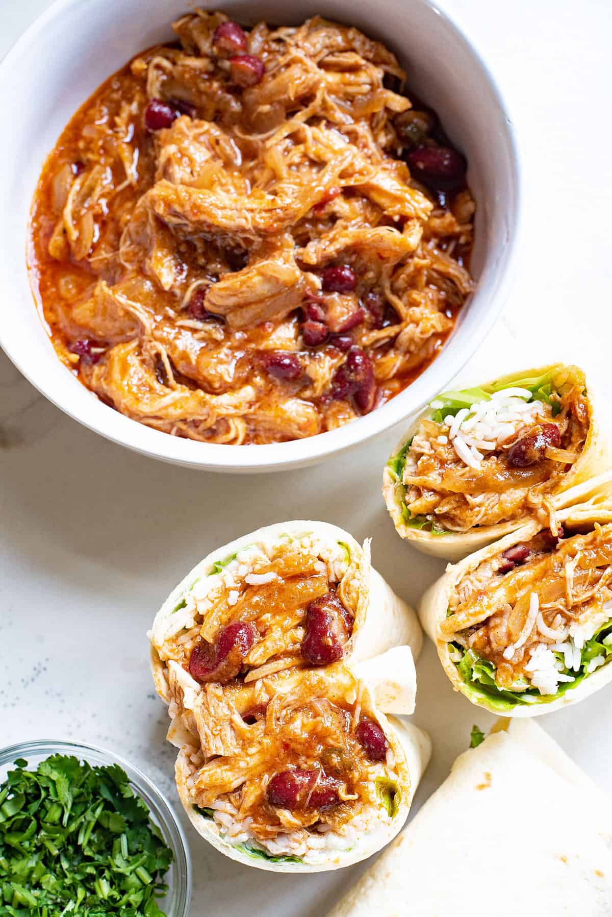 shredded Mexican Pork Burritos with bowl of meat