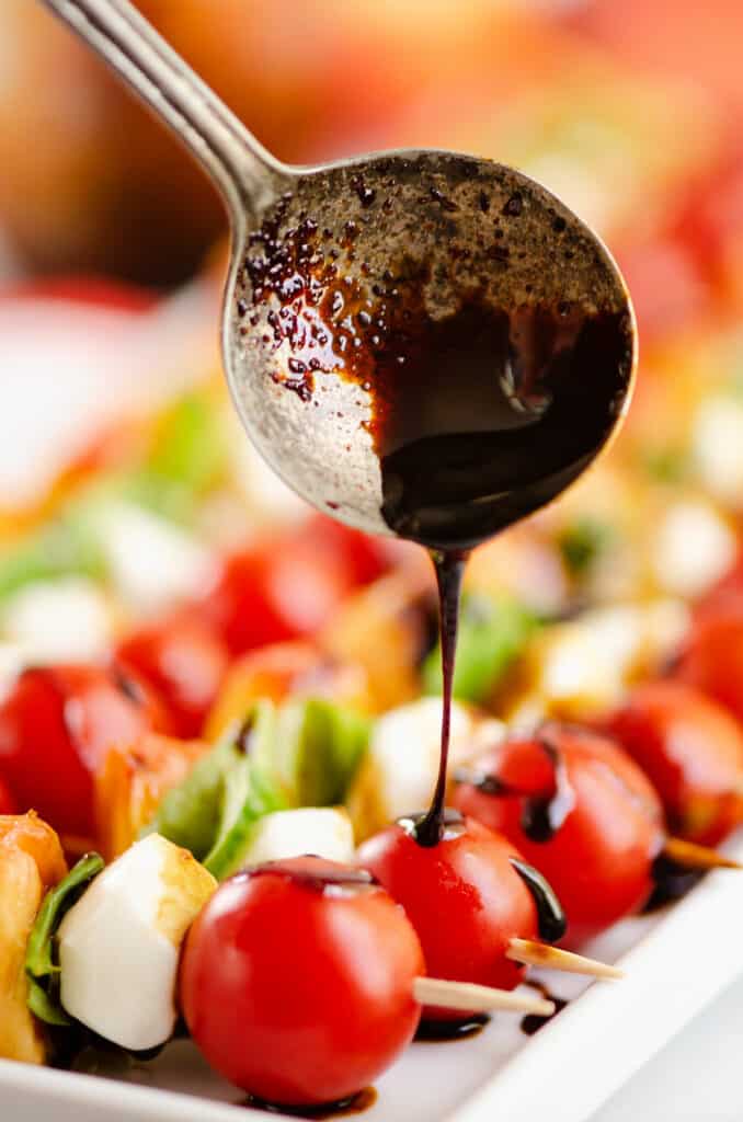 balsamic glaze drizzle over caprese bites