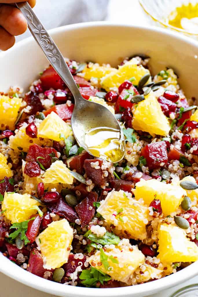 homemade honey vinaigrette spooned over Beet & Orange Quinoa Salad