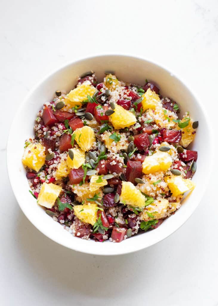 Beet & Orange Quinoa Salad mixed in bowl